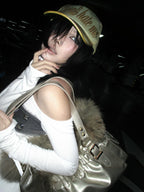 Studded Cross Top worn editorial — Oryn Laeth